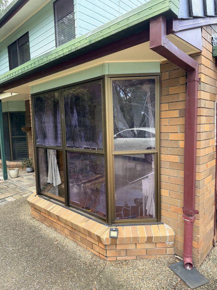 Before window film removal — failing bubbling tint